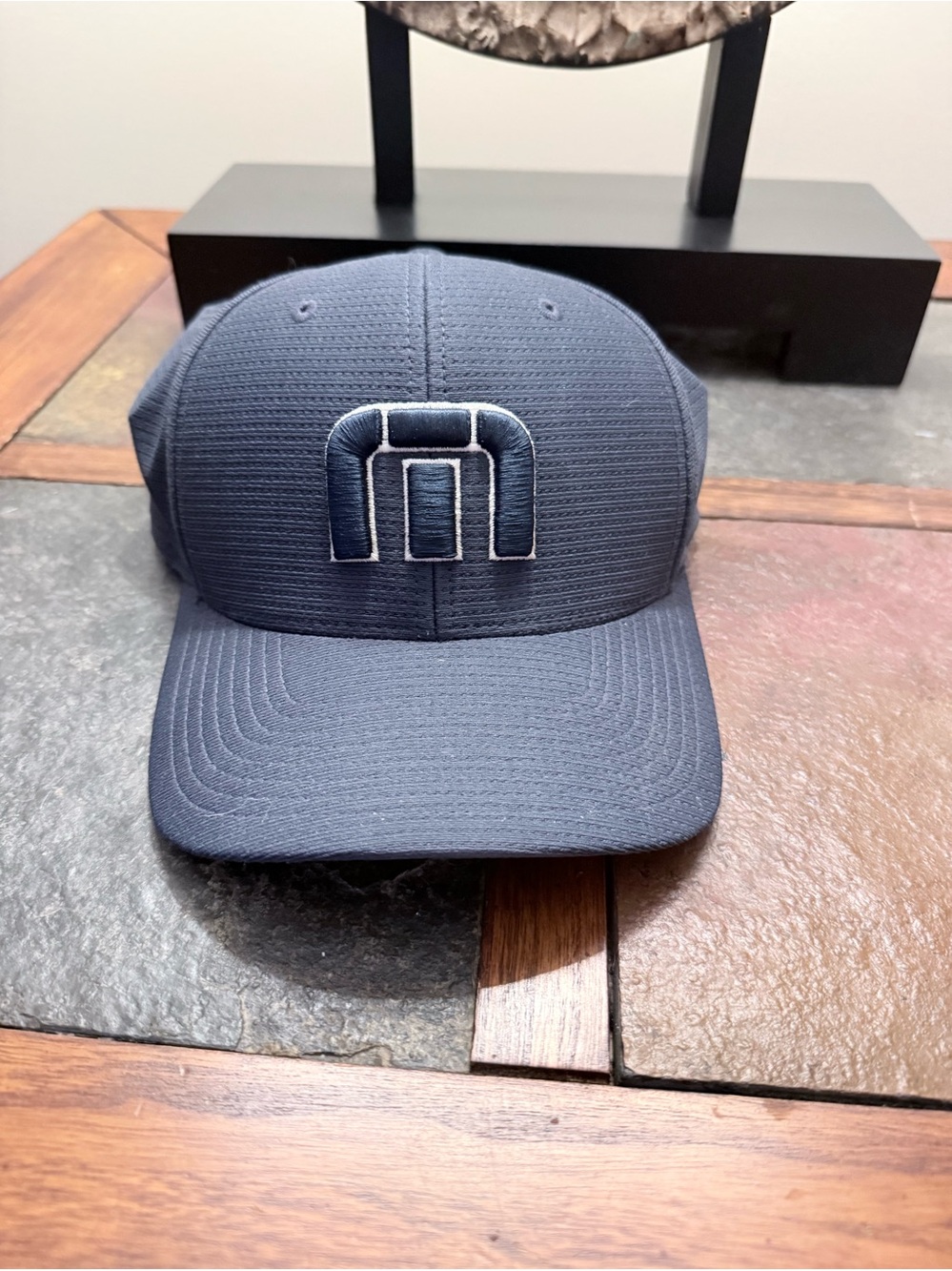 Travis Mathew’s Navy Mesh Logo Baseball Cap